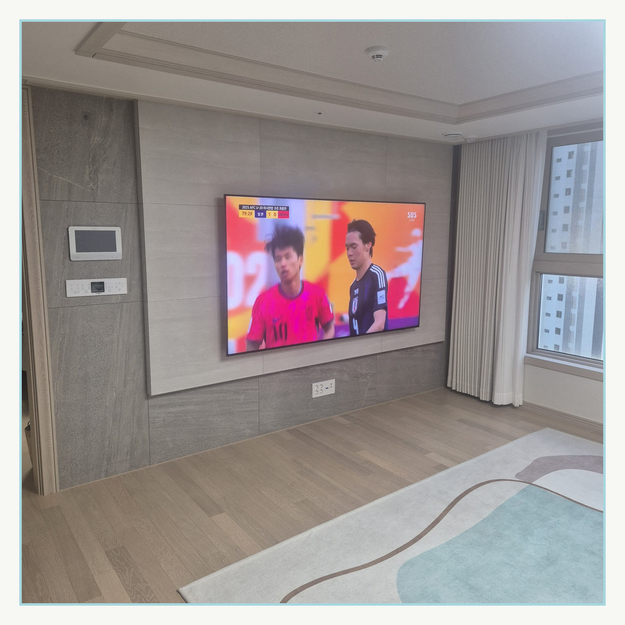 수정구 생활권 관련 자료 · 벽면 폭과 설치된 TV의 시선 높이를 함께 살펴보는 참고 이미지